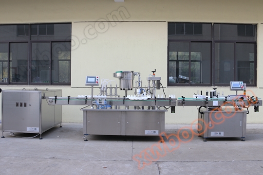 精油、滴下剤充填回転蓋機